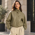 khaki leather jacket
sheepskin jacket
funnel neck jacket
oversized jacket
womens leather
leather bomber
high neck jacket
khaki jacket
genuine leather
zip pocket jacket
waist length jacket
minimalist jacket
womens outerwear