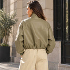 khaki leather jacket
sheepskin jacket
funnel neck jacket
oversized jacket
womens leather
leather bomber
high neck jacket
khaki jacket
genuine leather
zip pocket jacket
waist length jacket
minimalist jacket
womens outerwear
