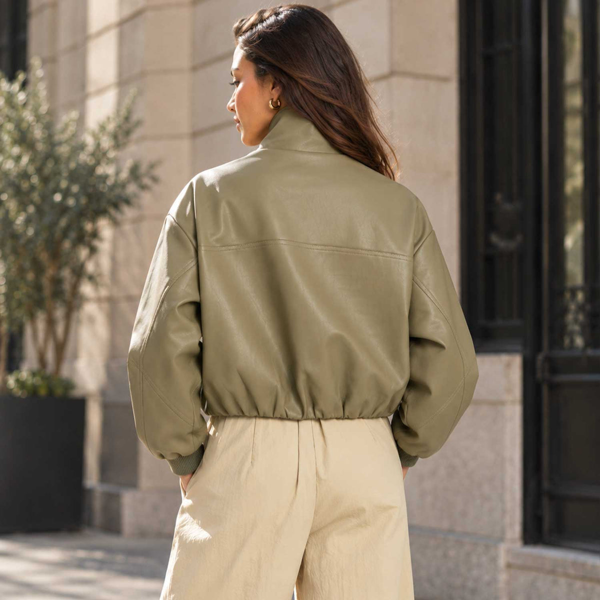 khaki leather jacket
sheepskin jacket
funnel neck jacket
oversized jacket
womens leather
leather bomber
high neck jacket
khaki jacket
genuine leather
zip pocket jacket
waist length jacket
minimalist jacket
womens outerwear